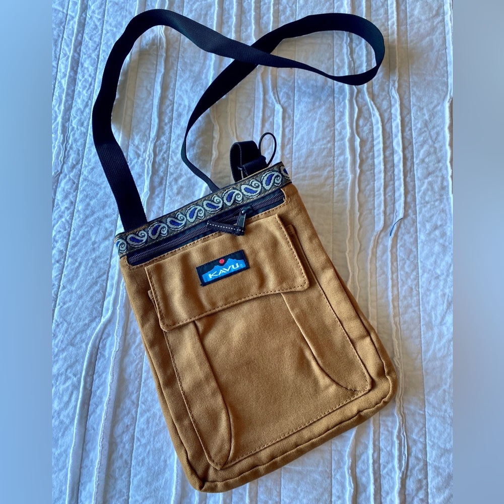 KAVU crossbody bag. Brand new never used. Matching wallet also available.